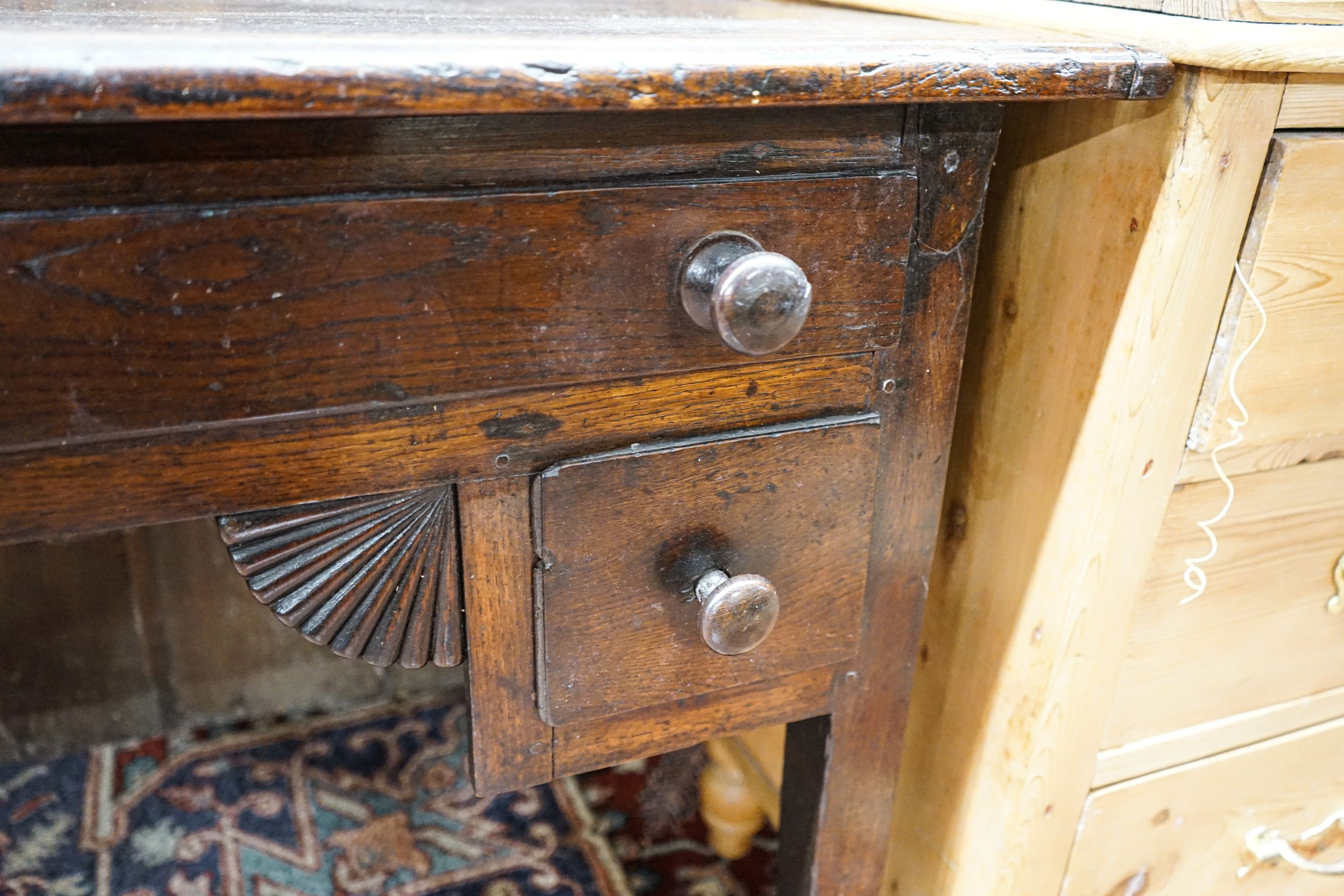 An early 19th century oak low boy, fitted three drawers, on square tapered legs, width 94cm, depth 55cm, height 77cm
